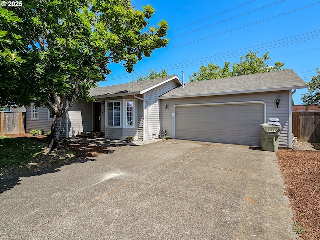 1684 NE 87th Ave, Hillsboro, OR 97006 - ranch-style home with roof with shingles, driveway, and a garage