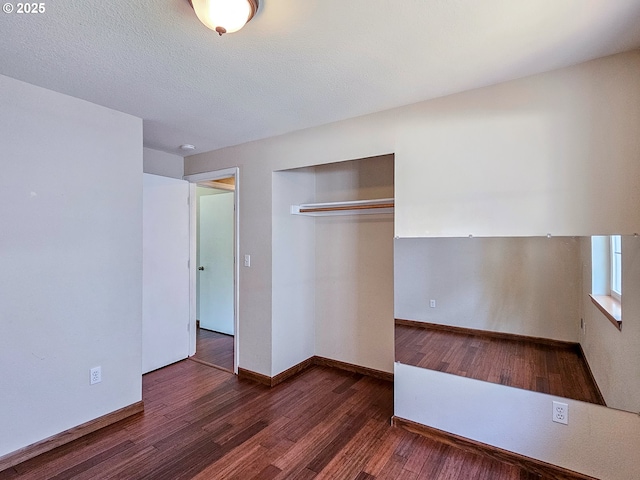 1684 NE 87th Ave, Hillsboro, OR 97006 - unfurnished bedroom with wood finished floors, a closet, and baseboards