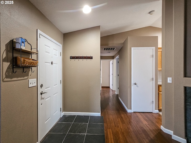 1684 NE 87th Ave, Hillsboro, OR 97006 - entrance foyer with a textured wall, baseboards, dark wood-style floors, and lofted ceiling