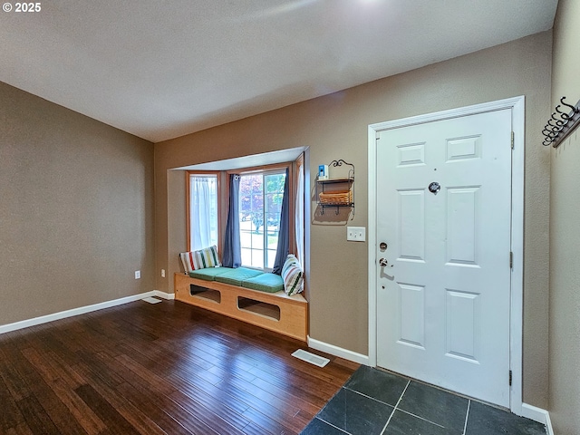 1684 NE 87th Ave, Hillsboro, OR 97006 - foyer entrance with dark wood-style floors and baseboards