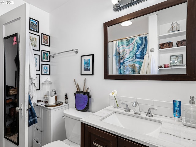 1560 S Downing St, Seaside, OR 97138 - full bathroom featuring vanity and toilet