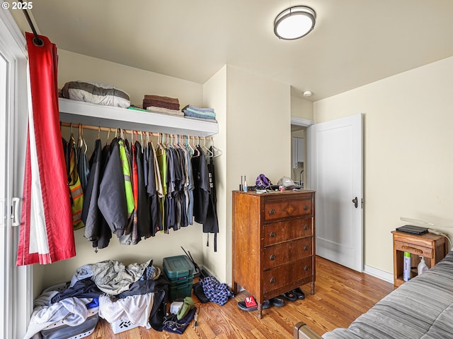 1560 S Downing St, Seaside, OR 97138 - bedroom featuring wood finished floors and baseboards