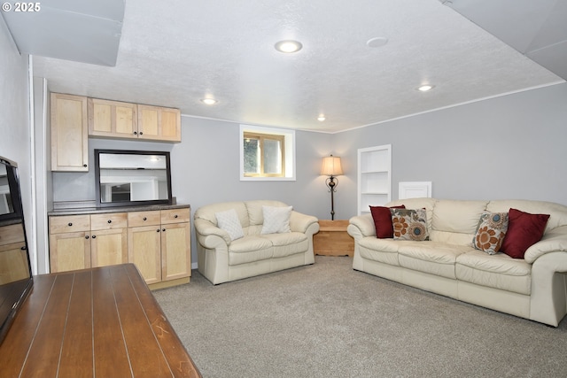 carpeted living area featuring recessed lighting
