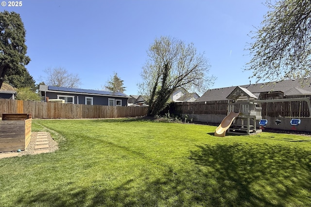 view of yard with a playground