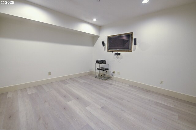 619 SW Foresta Ter, Portland, OR 97225 - below grade area with recessed lighting, wood finished floors, and baseboards
