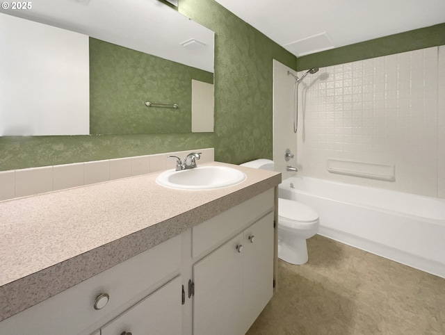 full bath with bathing tub / shower combination, toilet, and vanity