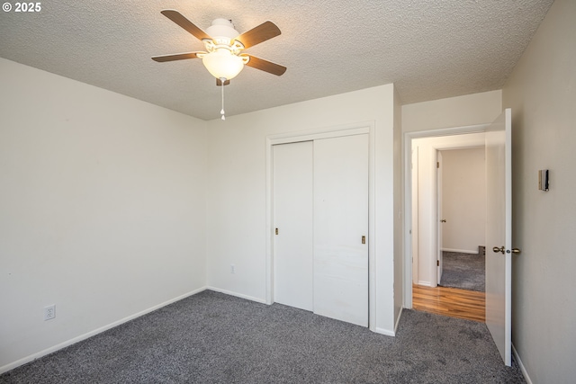 42 Sooter Rd, Underwood, WA 98651 - unfurnished bedroom with carpet, a closet, a textured ceiling, and a ceiling fan