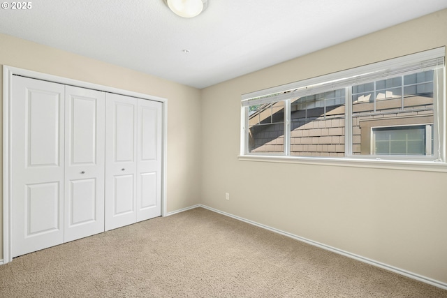 15971 NW Hildago Ln, Portland, OR 97229 - unfurnished bedroom featuring carpet and a closet