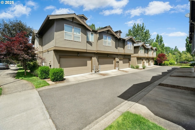 15971 NW Hildago Ln, Portland, OR 97229 - view of front of property featuring an attached garage