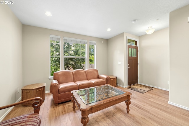 15971 NW Hildago Ln, Portland, OR 97229 - living room with light wood finished floors and recessed lighting
