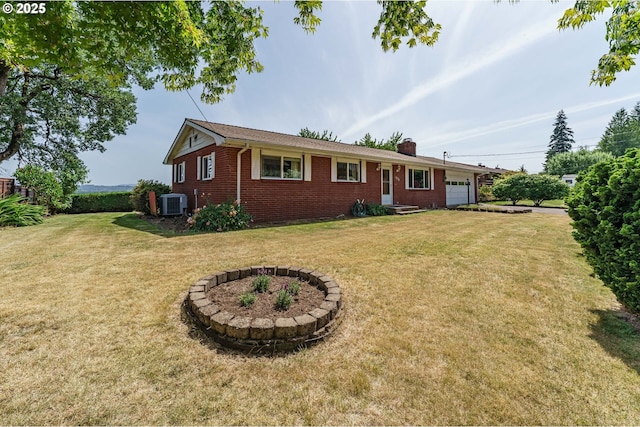 1938 NW Sierra Ln, Camas, WA 98607 - view of front facade with a garage, brick siding, a chimney, and a front yard