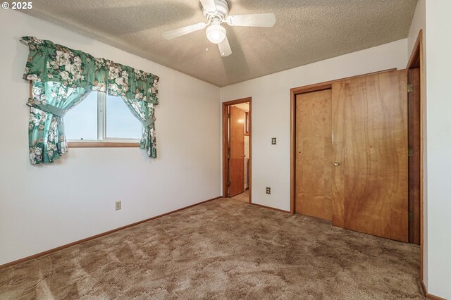 1938 NW Sierra Ln, Camas, WA 98607 - unfurnished bedroom featuring carpet, a textured ceiling, a closet, and ceiling fan