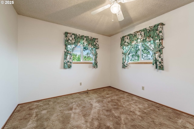 1938 NW Sierra Ln, Camas, WA 98607 - carpeted empty room featuring plenty of natural light, ceiling fan, and a textured ceiling