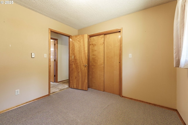 1938 NW Sierra Ln, Camas, WA 98607 - unfurnished bedroom with light colored carpet, a closet, and a textured ceiling
