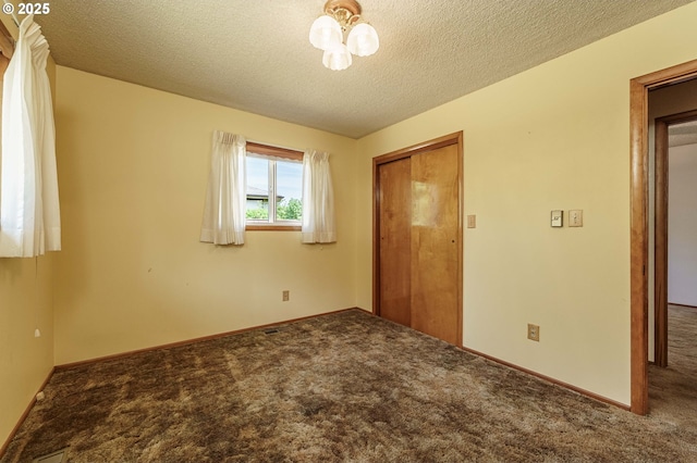 1938 NW Sierra Ln, Camas, WA 98607 - unfurnished bedroom with carpet, a textured ceiling, and a closet