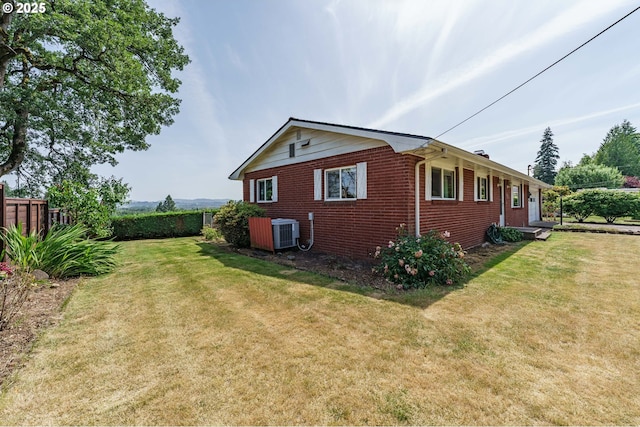 1938 NW Sierra Ln, Camas, WA 98607 - view of side of home with brick siding and a cooling unit