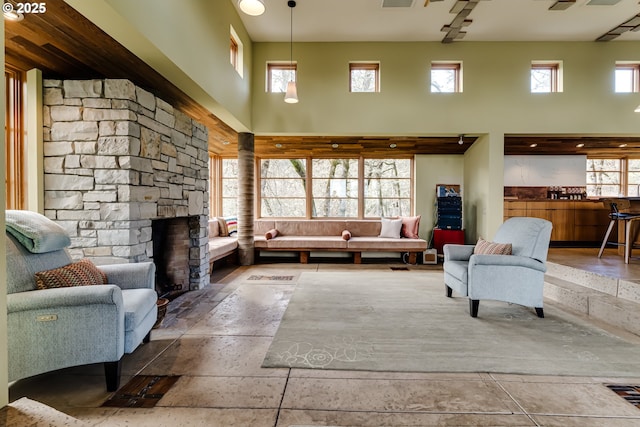 85789 Allbritain Ln, Eugene, OR 97405 - living area featuring a high ceiling and a stone fireplace