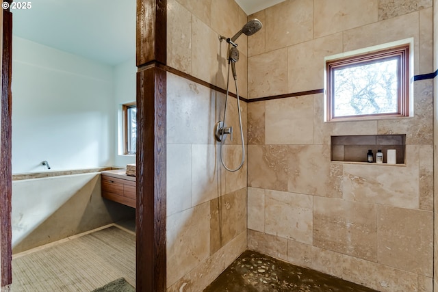 85789 Allbritain Ln, Eugene, OR 97405 - full bath featuring a tile shower, vanity, and plenty of natural light