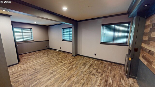 29847 Hillcrest St, Gold Beach, OR 97444 - unfurnished room featuring ornamental molding, wood finished floors, healthy amount of natural light, baseboards, and recessed lighting