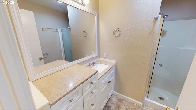 29847 Hillcrest St, Gold Beach, OR 97444 - bathroom featuring vanity, a shower stall, and baseboards