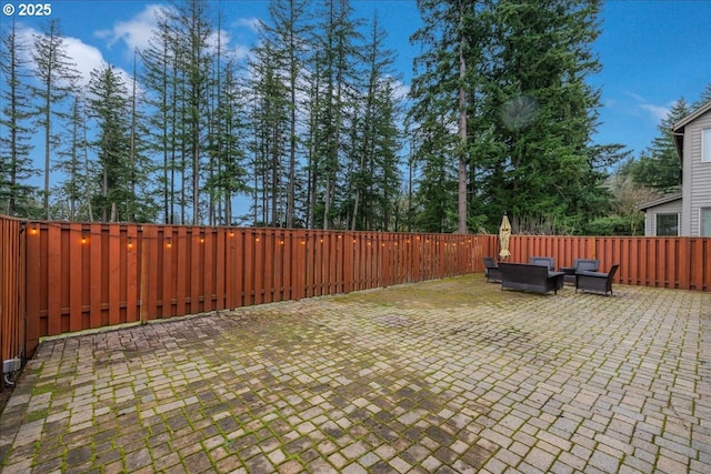 view of patio with a fenced backyard