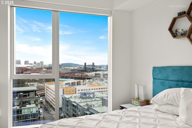 bedroom with a city view