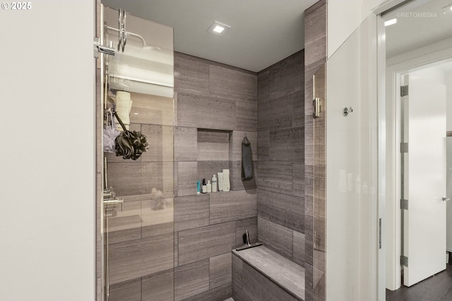 full bathroom with a shower stall