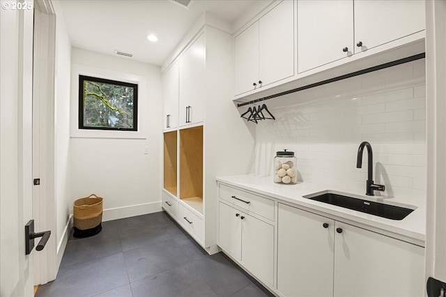 mudroom featuring sink