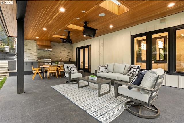 view of patio featuring ceiling fan, a grill, french doors, outdoor lounge area, and sink