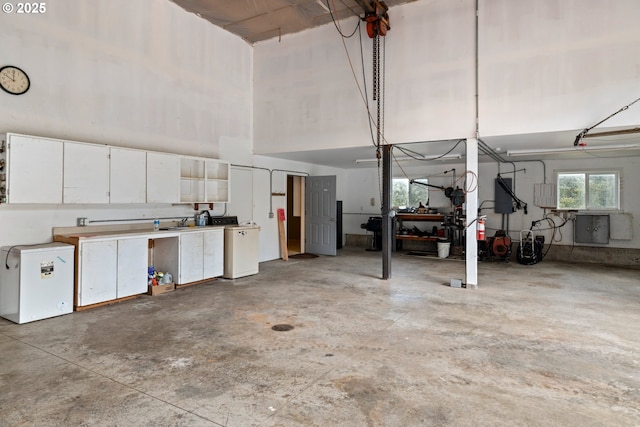 garage featuring fridge