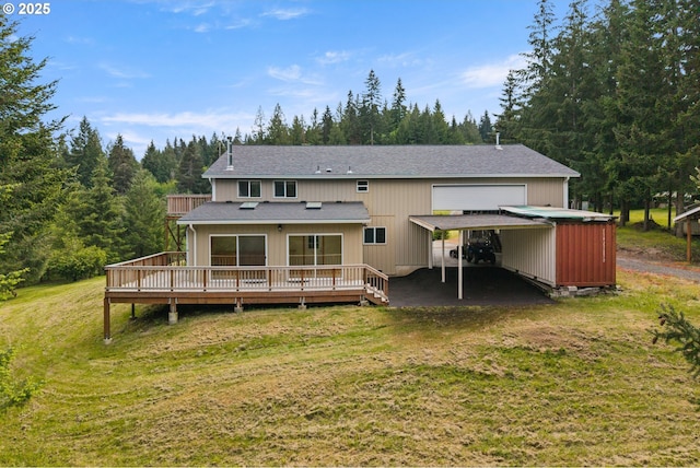back of property featuring a yard, a shingled roof, and a wooden deck