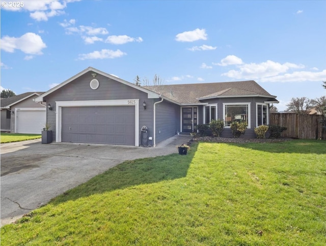 ranch-style home with a garage, concrete driveway, a front yard, and fence