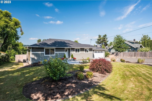 15915 SE Harold Ave, Milwaukie, OR 97267 - view of front facade with an attached garage and a shingled roof