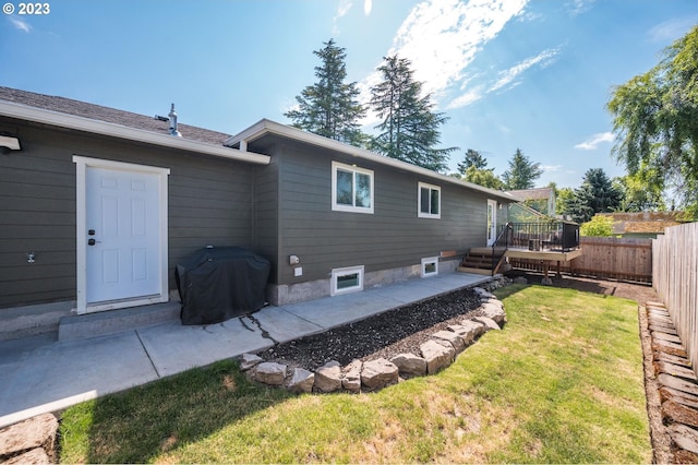 15915 SE Harold Ave, Milwaukie, OR 97267 - rear view of house featuring a deck and a patio area