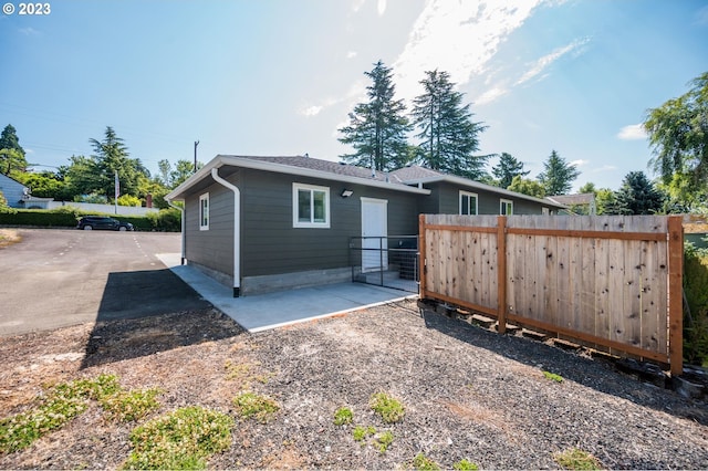 15915 SE Harold Ave, Milwaukie, OR 97267 - rear view of property featuring fence and a patio