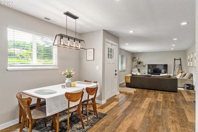 15915 SE Harold Ave, Milwaukie, OR 97267 - dining area featuring wood finished floors, healthy amount of natural light, baseboards, and recessed lighting