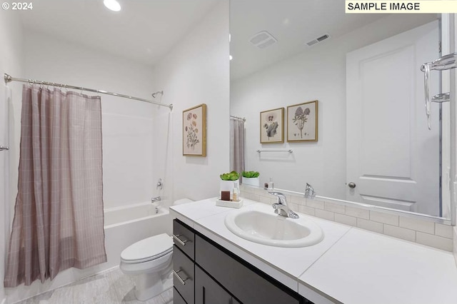 bathroom with toilet, shower / bath combo, vanity, and recessed lighting