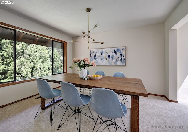 1929 SW Broadleaf Dr, Portland, OR 97219 - dining room with light colored carpet and a chandelier