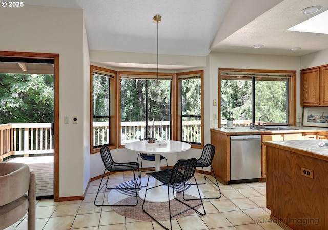 1929 SW Broadleaf Dr, Portland, OR 97219 - dining area featuring light tile patterned flooring and healthy amount of natural light