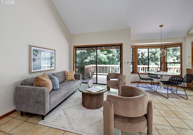 1929 SW Broadleaf Dr, Portland, OR 97219 - living area with plenty of natural light, light tile patterned floors, and high vaulted ceiling