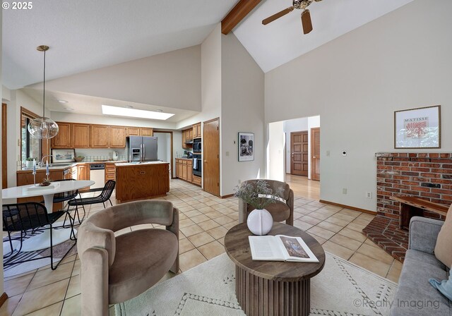 1929 SW Broadleaf Dr, Portland, OR 97219 - living area featuring high vaulted ceiling, ceiling fan, light tile patterned floors, beam ceiling, and a fireplace
