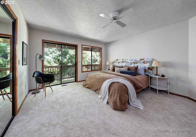 1929 SW Broadleaf Dr, Portland, OR 97219 - bedroom featuring carpet, a textured ceiling, access to exterior, and a ceiling fan