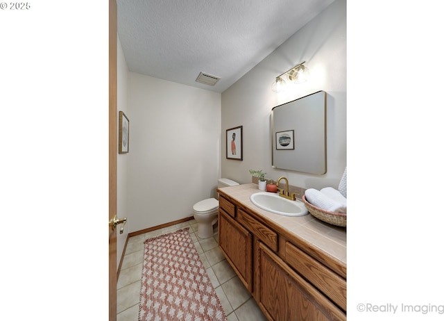 1929 SW Broadleaf Dr, Portland, OR 97219 - bathroom featuring vanity, tile patterned flooring, and a textured ceiling