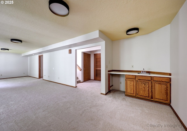 1929 SW Broadleaf Dr, Portland, OR 97219 - indoor wet bar with light carpet, a textured ceiling, and stairs