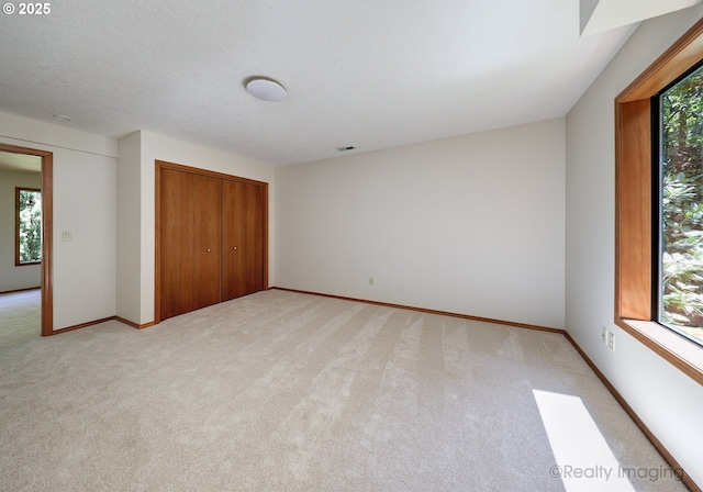 1929 SW Broadleaf Dr, Portland, OR 97219 - unfurnished bedroom featuring light carpet and a closet