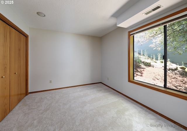 1929 SW Broadleaf Dr, Portland, OR 97219 - unfurnished bedroom featuring light carpet and a closet