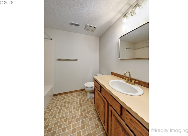 1929 SW Broadleaf Dr, Portland, OR 97219 - full bath with vanity, tile patterned floors, a textured ceiling, and bathing tub / shower combination