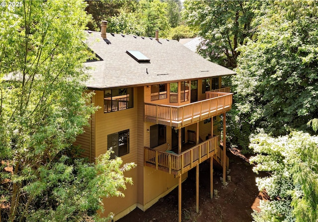 1929 SW Broadleaf Dr, Portland, OR 97219 - rear view of house with a balcony and a shingled roof
