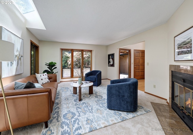 1929 SW Broadleaf Dr, Portland, OR 97219 - carpeted living room with a fireplace and a skylight