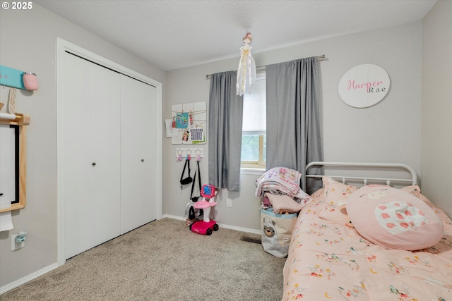 625 SE 7th Pl, Canby, OR 97013 - carpeted bedroom with a closet and baseboards